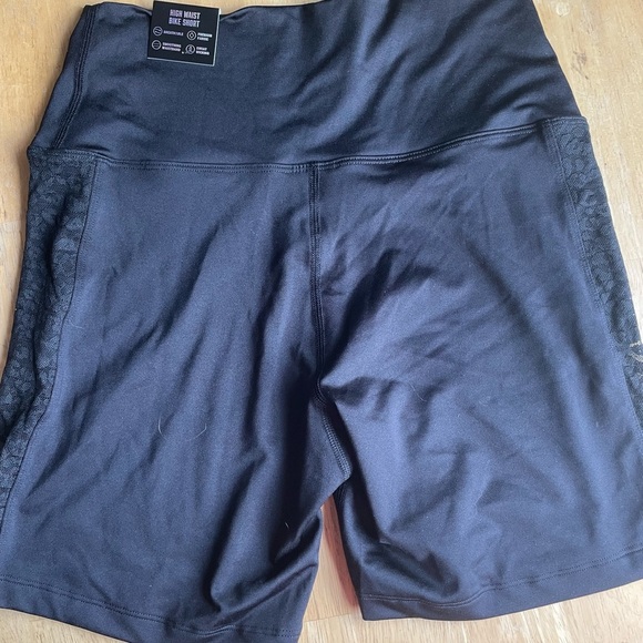 Pink high waisted bike shorts. - Picture 2 of 8